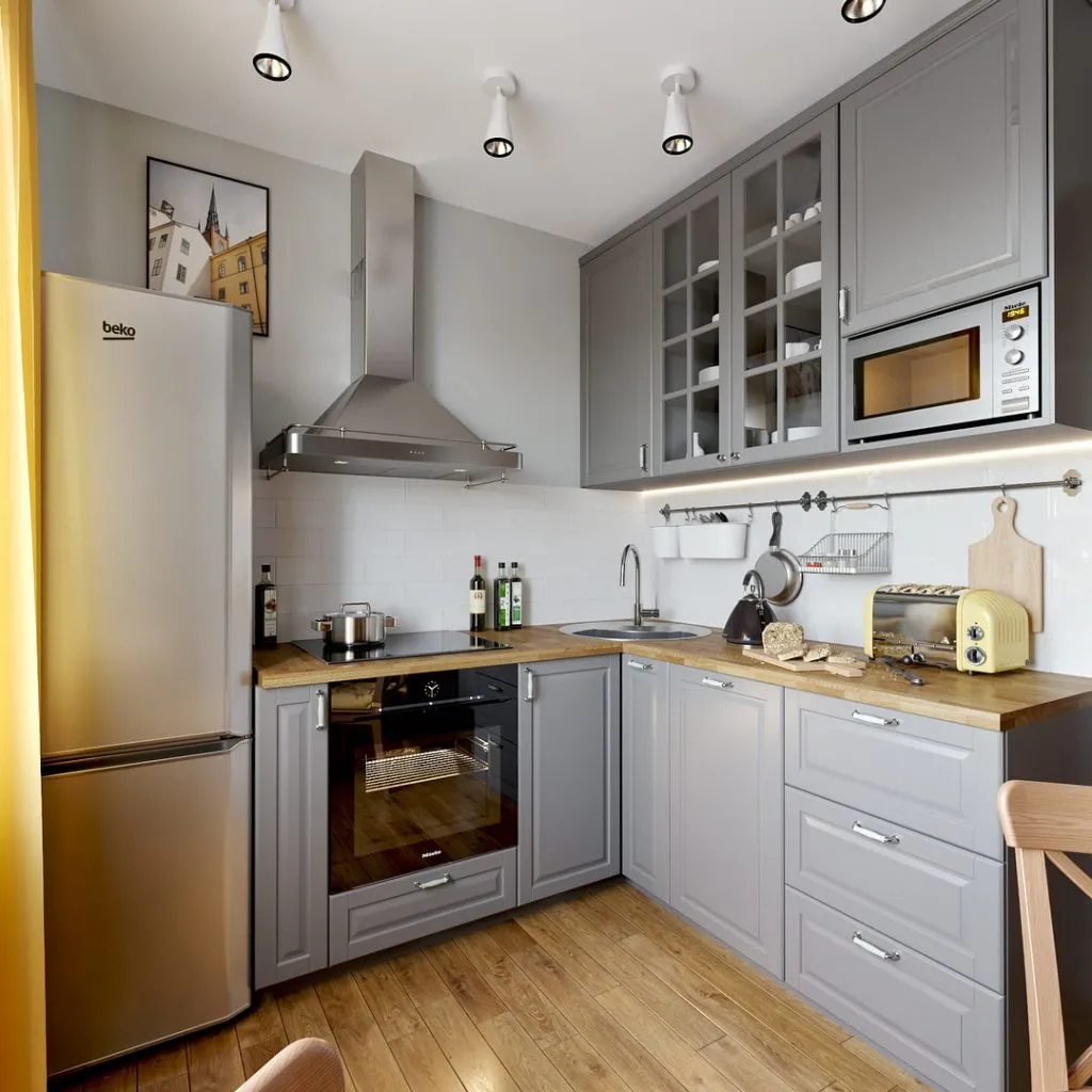 Кухонный гарнитур серого цвета со шкафами в потолок