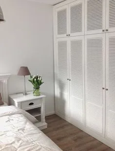 White louvers, soft silver grey paint, planked vinyl floors and white furnishings.... Bedroom Closet Doors, Laundry Room Doors, Home Decor Bedroom, Home Interior Design